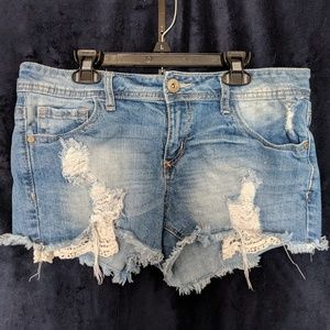 Distressed jean shorts